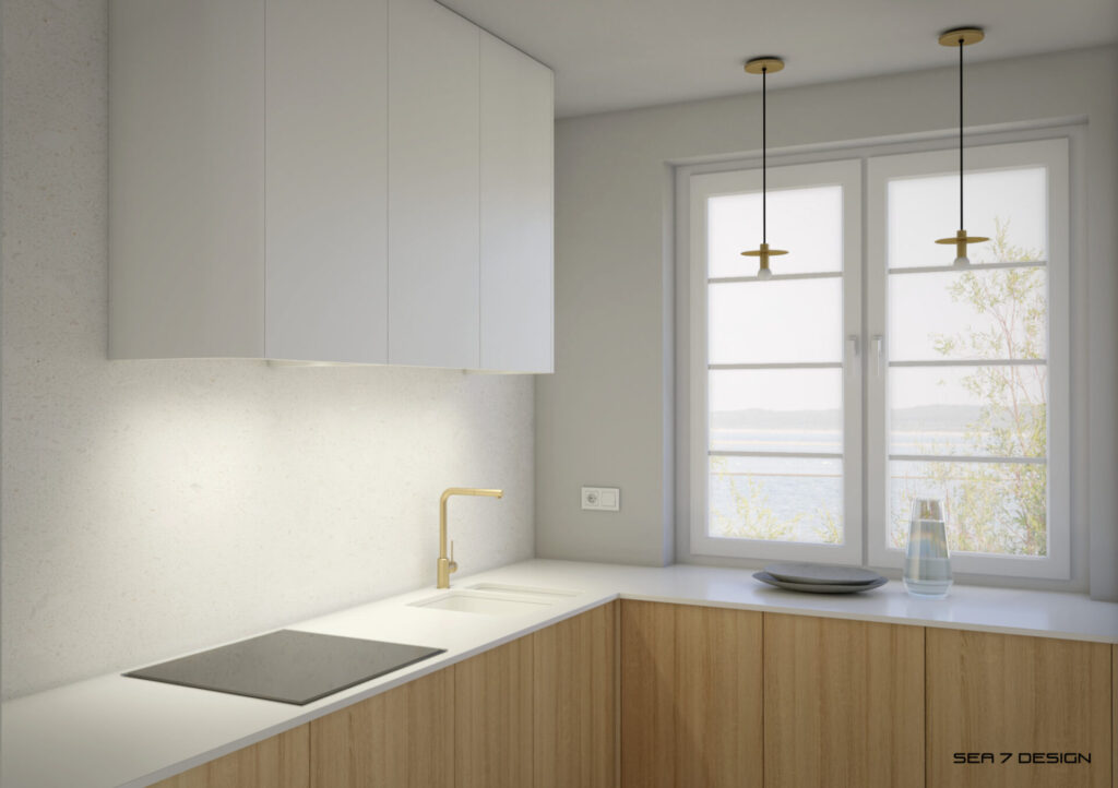 Sea 7 Design, Blue Minima Apartment, a kitchen with a window. White hanging cabinets with rounded corners, a white countertop, cabinets with oak veneer doors, minimalist brass hanging lamps over the countertop.