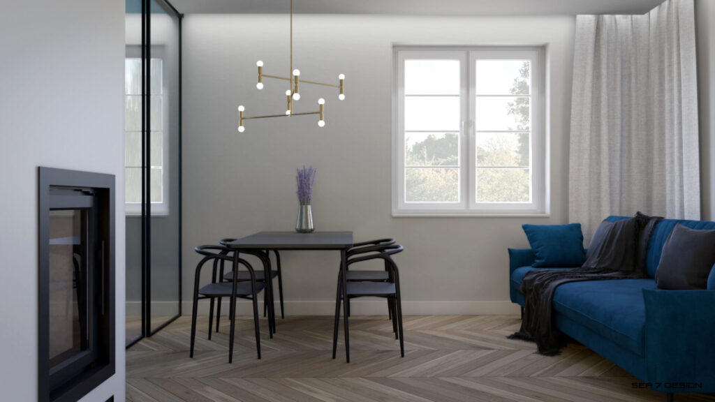 Sea 7 Design, Blue Minima Apartment, living room, view on a blue velvet sofa and a black table with black chairs. Over the table is a brass hanging lamp.