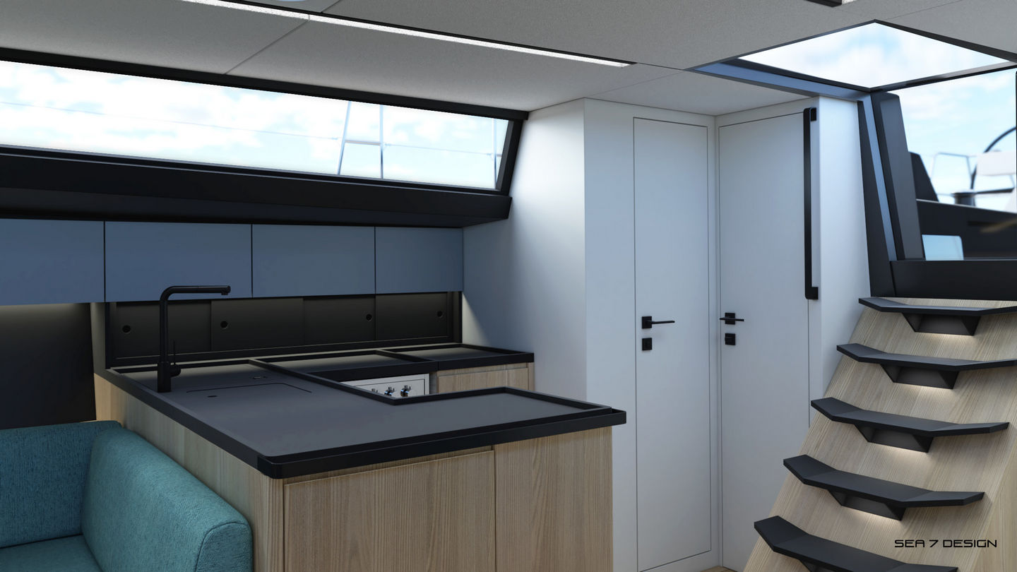 Sea 7 Design, yacht 50 ft interior design, the view of the galley and stairs to an open deck, light wood, white walls, middle gray hanging cabinets, black countertop, and black faucet. Black steps with lighting on the wooden cover of the engine room.